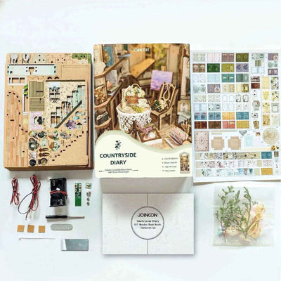 Pastoral book nook kit contents with wooden panels, printed decorations, lighting parts and instructions.