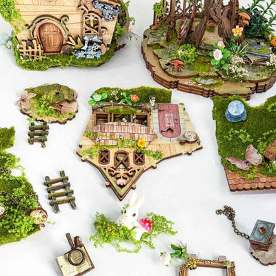Rowan's Treehouse panels, stairs, foliage and miniature accessories laid out for assembly.