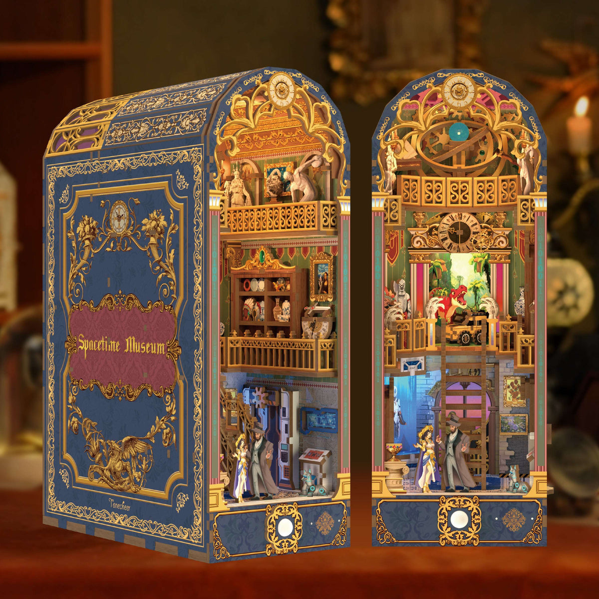 Spacetime Museum shown from two angles, with blue-and-gold covers and illuminated displays.