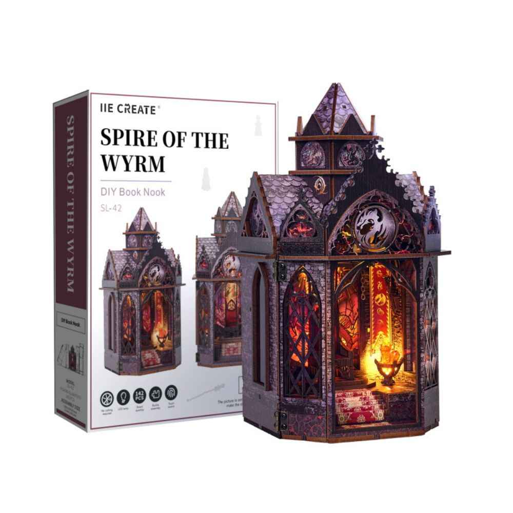 Spire of the Wyrm book nook beside its illustrated kit box.