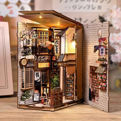 The Alley Waiting for the Cat with its roof and side panel open to reveal the miniature street.
