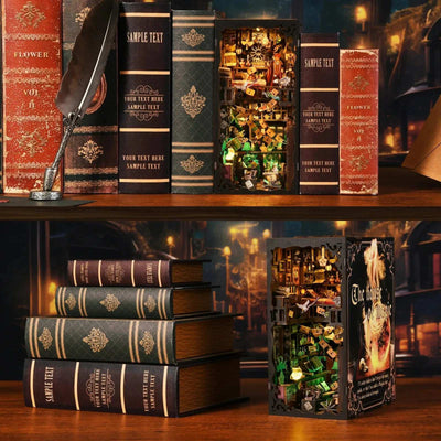The House of Magic book nook shown between books and beside stacked volumes.