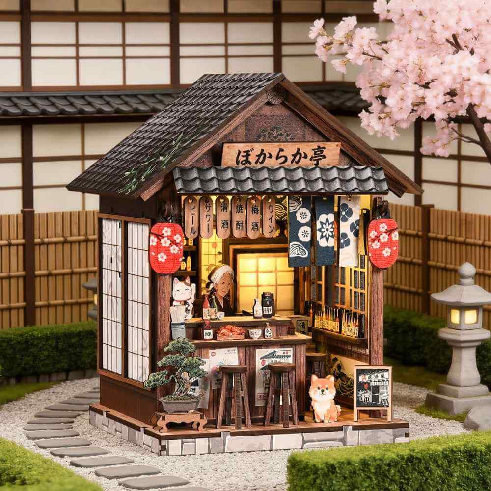 The Mellow Pub miniature Japanese tavern with lanterns, a tiled roof and an open serving counter.