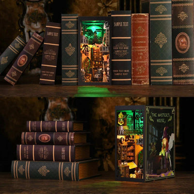 The Monster's House book nook displayed on a shelf and beside a stack of books.