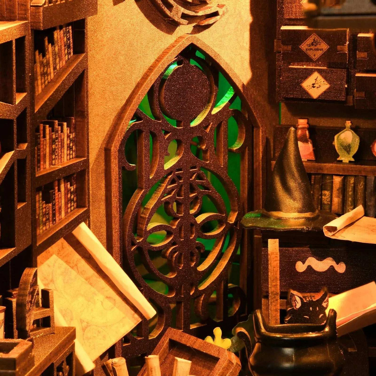 Ornate green-backed circular doorway and miniature bookshelves inside The Monster's House.