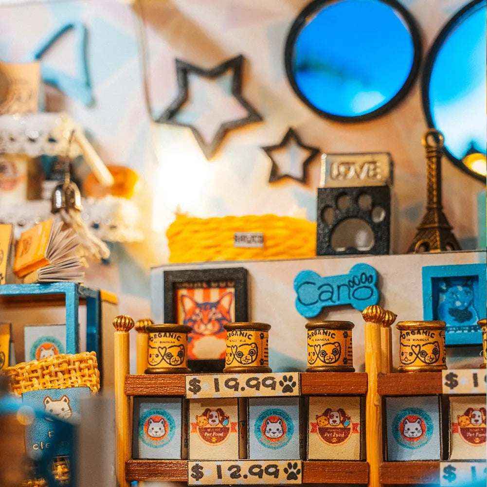 The Pet Club interior wall with star and moon decorations above miniature pet-food shelves.