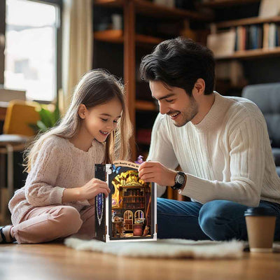 Adult and child examining The Realm of the Magic Book book nook together.