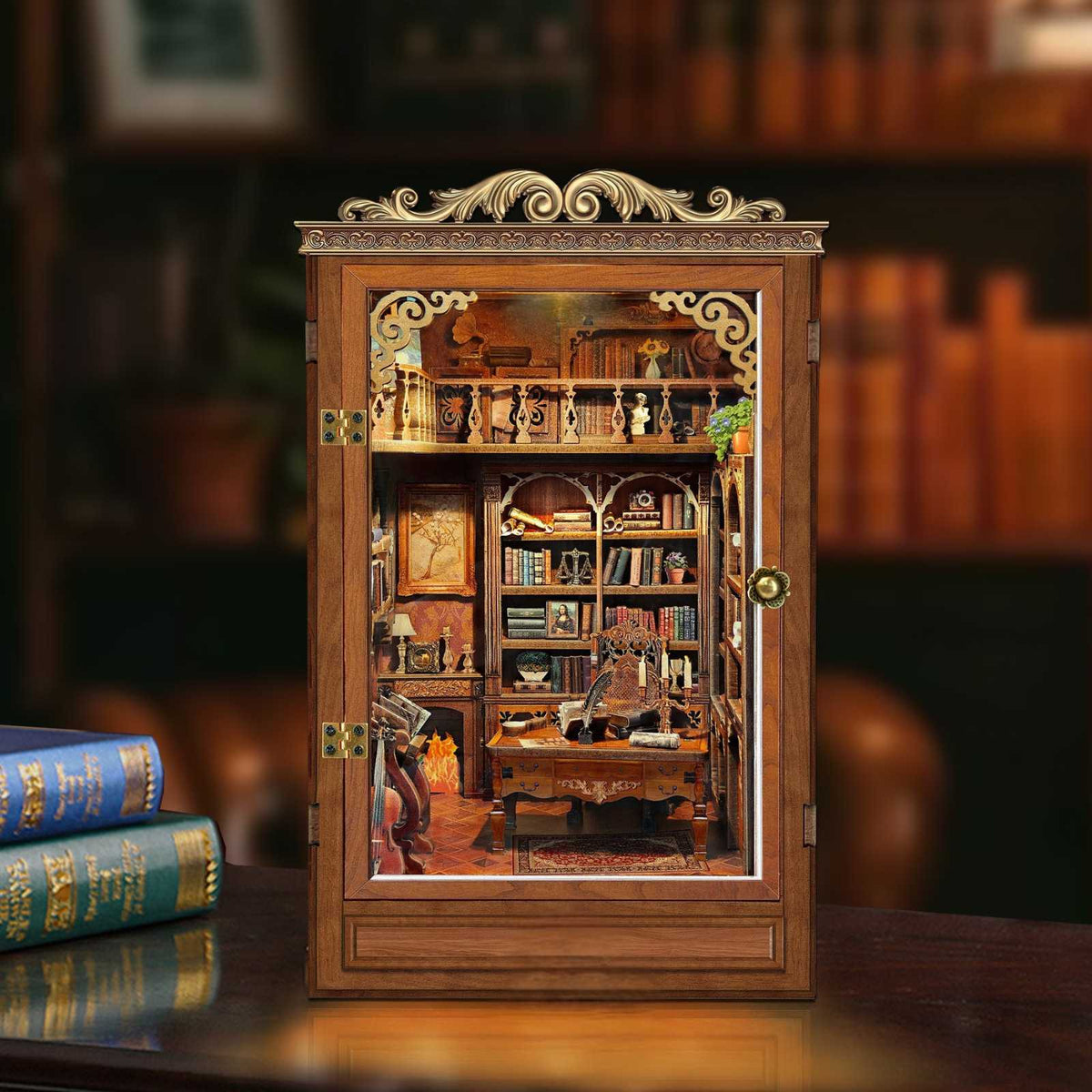 Time Book House book nook with an ornate cabinet-style frame and miniature reading room.
