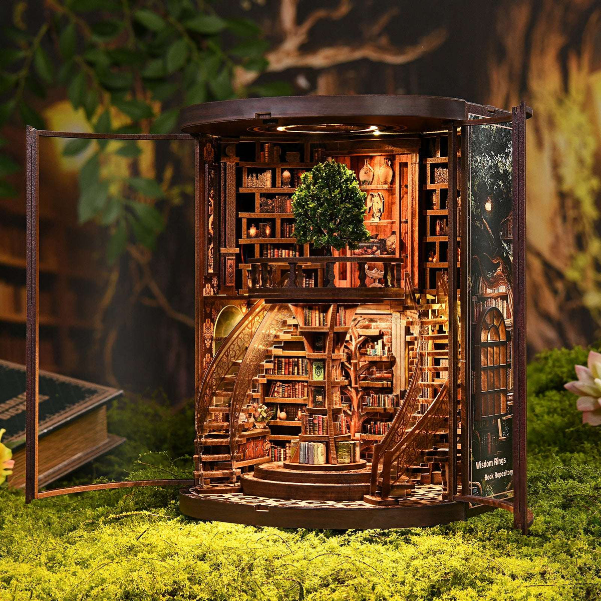 Wisdom Rings Books Repository with curved stairs, miniature library shelves and a tree on the upper floor.