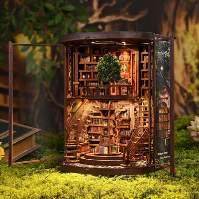 Wisdom Rings Books Repository with curved stairs, miniature library shelves and a tree on the upper floor.