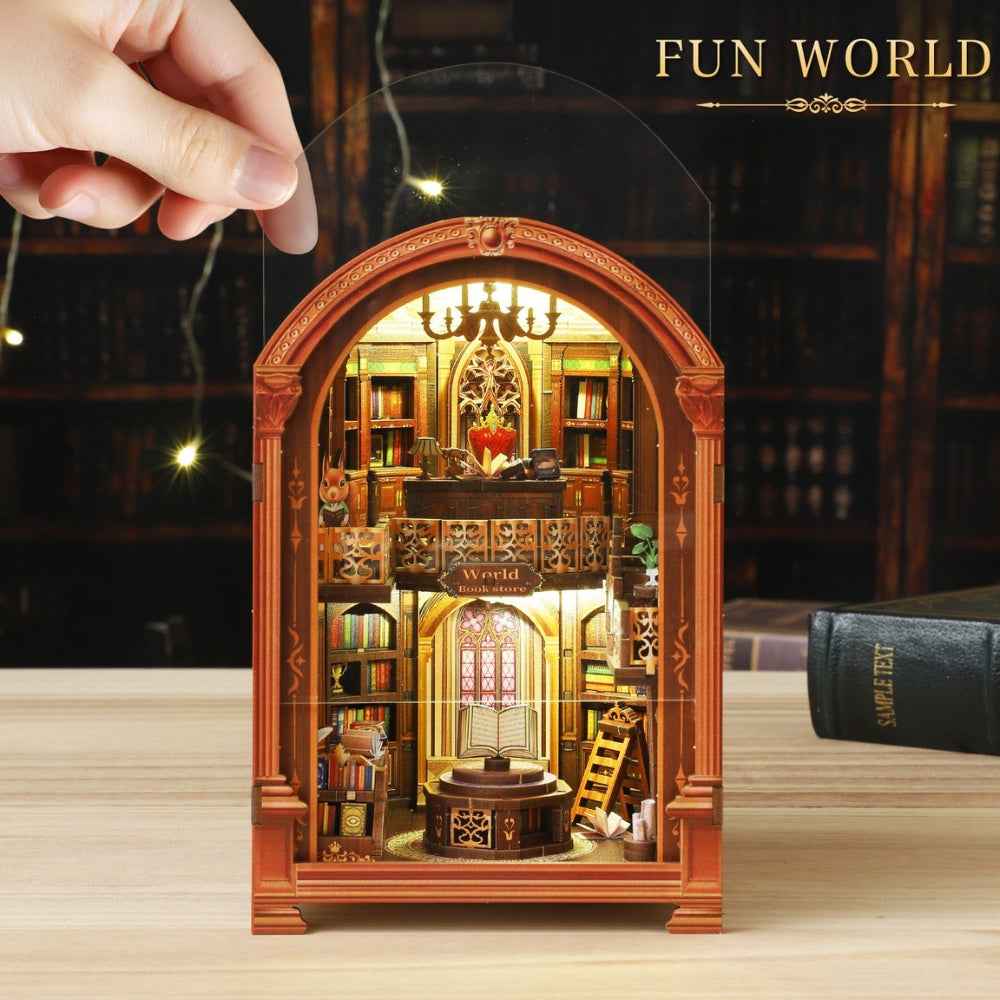 Hand lifting the clear cover from World Bookstore.