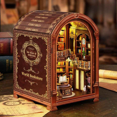 World Bookstore book nook with a rounded arch and two levels of miniature bookshelves.